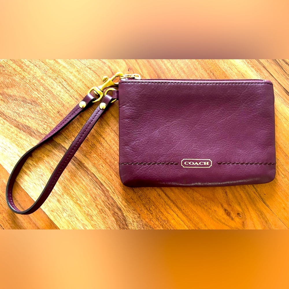 Coach wristlet, burgundy/merlot color